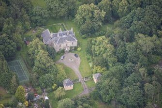 Oblique aerial view of Morton House, Garage and Walled Courtyard, looking SE.