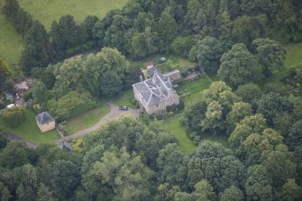 Oblique aerial view of Morton House, Garage and Walled Courtyard, looking NE.