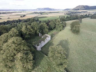 Oblique aerial view of Dowhill Castle looking ENE.