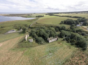 Oblique aerial view of Skelbo Castle looking ESE.