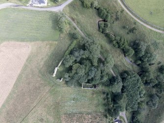 Near vertical oblique aerial view of Skelbo Castle looking east.