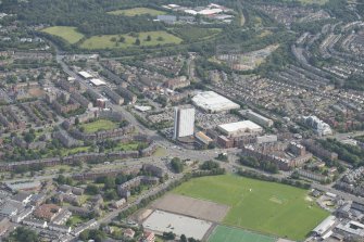 Oblique aerial view of Anniesland Court, looking NE.