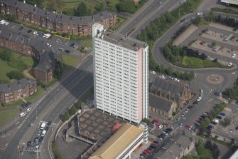 Oblique aerial view of Anniesland Court, looking NNW.