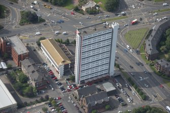 Oblique aerial view of Anniesland Court, looking SW.