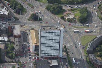 Oblique aerial view of Anniesland Court, looking SSW.