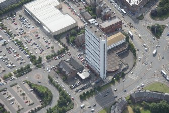 Oblique aerial view of Anniesland Court, looking SSE.