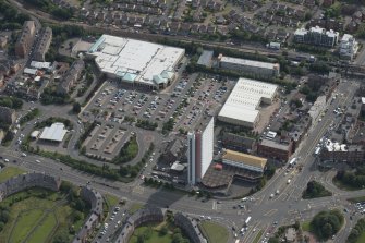 Oblique aerial view of Anniesland Court and shopping centre, looking ESE.