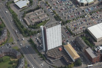 Oblique aerial view of Anniesland Court, looking ENE.