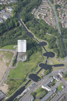 Oblique aerial view of the Kelvin Aqueduct and Maryhill Locks, looking W.