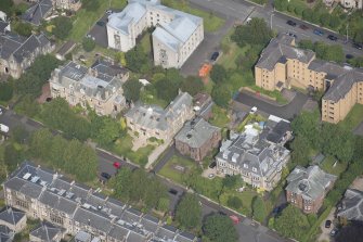 Oblique aerial view of 15 Cleveden Gardens, looking NW.