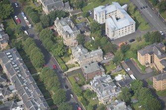 Oblique aerial view of 15 Cleveden Gardens, looking NNW.