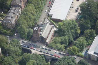 Oblique aerial view of Stevenson Memorial Free Church and Caretaker's House, looking E.