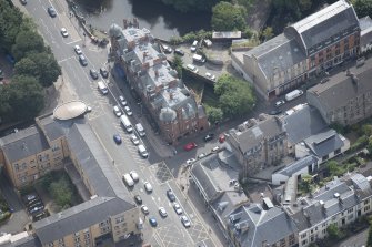 Oblique aerial view of 445 - 459 Great Western Road, looking SSE.
