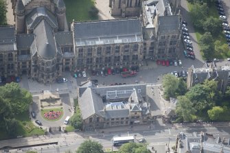 Oblique aerial view of University of Glasgow main building and Student Union, looking SSW.