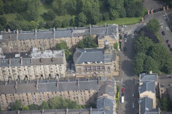 Oblique aerial view of Kelvingrove Parish Church, looking NE.