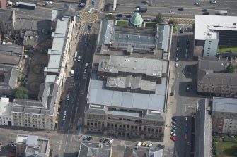 Oblique aerial view of St Andrew's Halls Theatre, looking E.