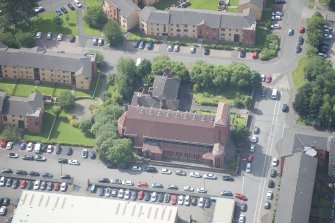 Oblique aerial view of the St Columba's Roman Catholic Church, looking SW.