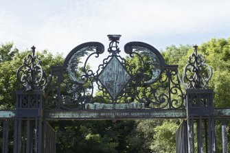 Decorative panel above gates from east side.