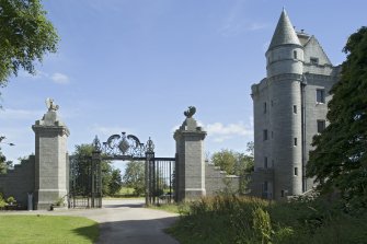 Gate pillars and south tower from north west.