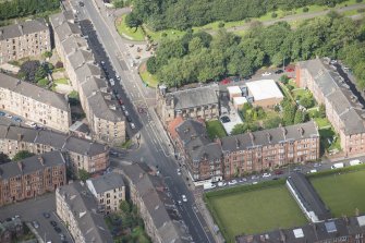 Oblique aerial view of St Andrew's East Church and Church Hall, looking NW.