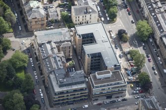 Oblique aerial view of La Belle Place, looking E.