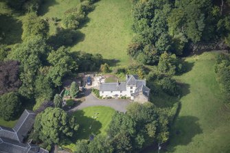 Oblique aerial view of Peel Tower House, looking W.