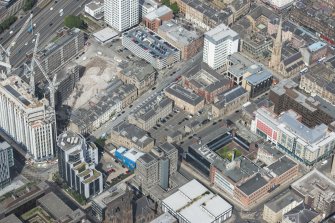 Oblique aerial view of Dalmore House, Holland Street, St Matthew's Blythswood Church and Elmbank Street, looking NW.