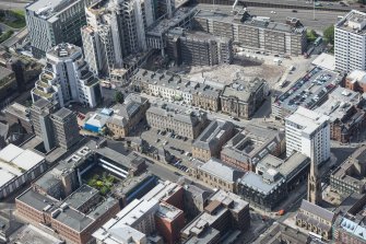 Oblique aerial view of Dalmore House, Holland Street, St Matthew's Blythswood Church and Elmbank Street, looking WSW.