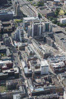 Oblique aerial view of Dalmore House, Holland Street, St Matthew's Blythswood Church and Elmbank Street, looking SSW.