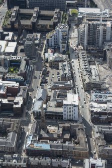 Oblique aerial view of Dalmore House, Holland Street, St Matthew's Blythswood Church and Elmbank Street, looking S.