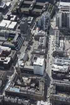 Oblique aerial view of Dalmore House, Holland Street, St Matthew's Blythswood Church and Elmbank Street, looking SSE.