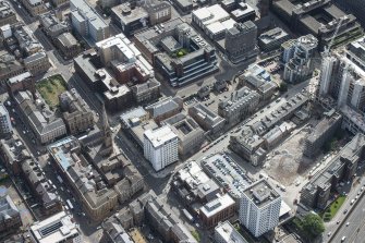 Oblique aerial view of Dalmore House, Holland Street, St Matthew's Blythswood Church and Elmbank Street, looking SE.