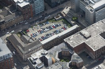 Oblique aerial view of James Watt Street, looking SE.