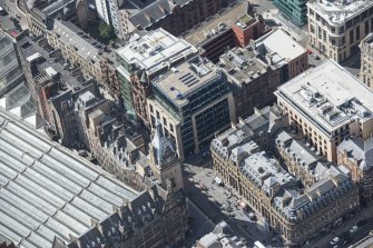Oblique aerial view of Central Station Hotel and Atlantic Chambers, looking SE.