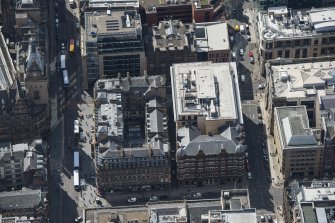 Oblique aerial view of the Scottish Temperance League Office Building and Daily Record Building, looking SSW.
