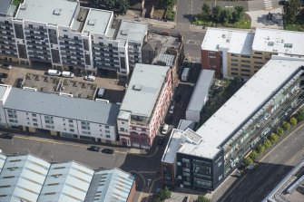 Oblique aerial view of Ozalid's Warehouse, looking ENE.