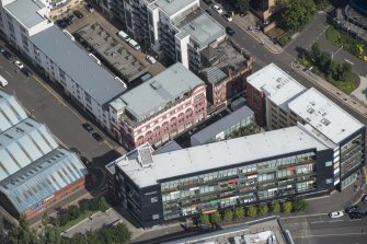 Oblique aerial view of Ozalid's Warehouse, looking NE.