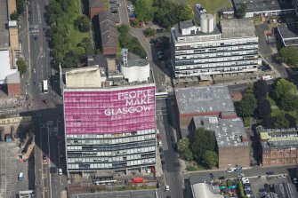 Oblique aerial view of Glasgow College of Building and Printing, looking NNW.