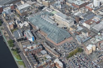 Oblique aerial view of St Enoch Shopping Centre and Custom House, looking SE.