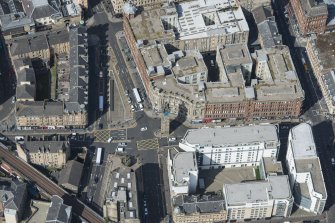 Oblique aerial view of the Trongate, Tolbooth Steeple and Mercat Building, looking WNW.