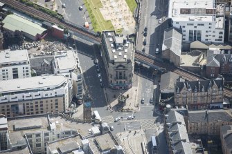 Oblique aerial view of the Trongate, Tolbooth Steeple and Mercat Building, looking SSE.