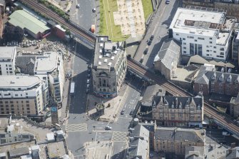 Oblique aerial view of the Trongate, Tolbooth Steeple and Mercat Building, looking SSE.