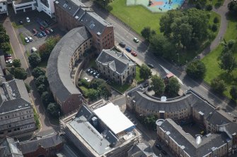 Oblique aerial view of St Andrew's by the Green Church, looking SSE.