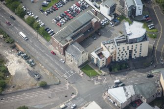 Oblique aerial view of 52 Charlotte Street, looking SW.
