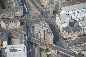 Oblique aerial view of Trongate Tolbooth Steeple, Town Hall and Tontine Hotel, looking NNW.