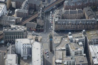 Oblique aerial view of Trongate Tolbooth Steeple, Town Hall and Tontine Hotel, looking SW.