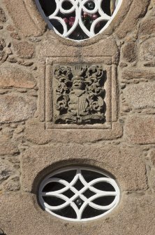 Detail of coat of arms above main entrance.
