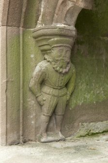 Detail of carved figure on left hand side of monument, William Forbes, 7th laird of Tolquhon.