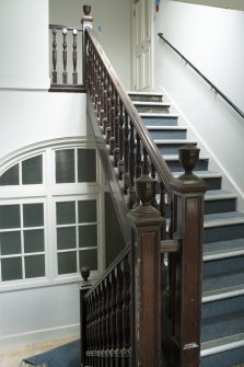 Interior. View of staircase to upper floor.