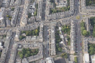 Oblique aerial view of Forth Street, Albany Street, Broughton Street, Hart Street, East London Street and Catholic Apostolic Church, looking SW.